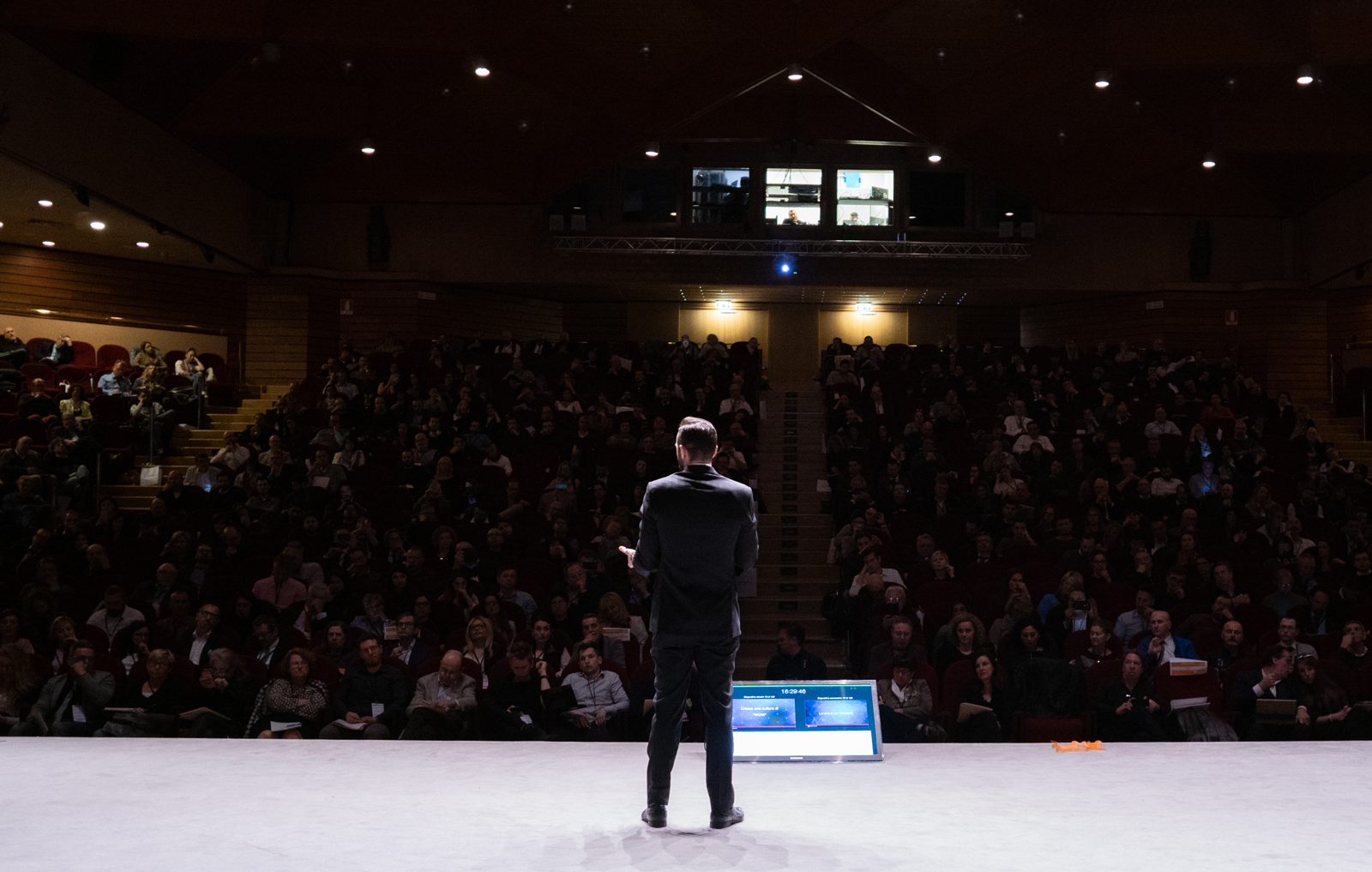 Full room, all eyes forward